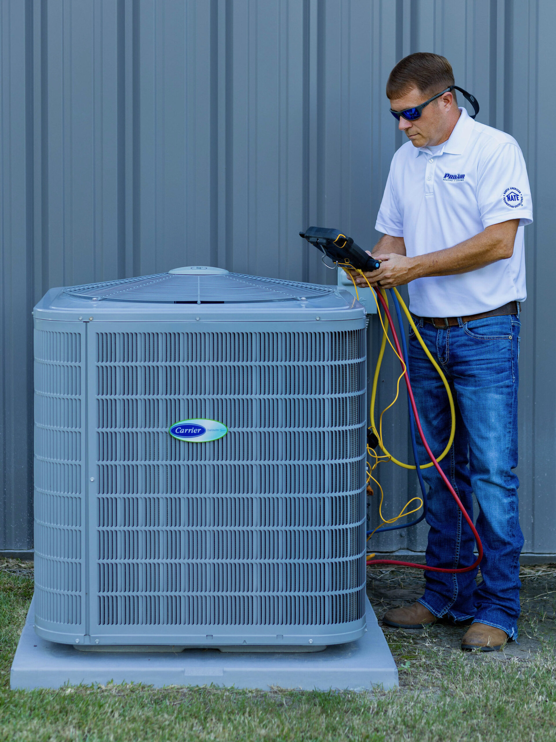 HVAC technician performing seasonal tune-up for a residential air conditioning system in Pooler GA